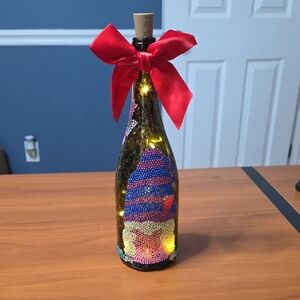 Decorative Wine Bottle with Red Bow and Lights